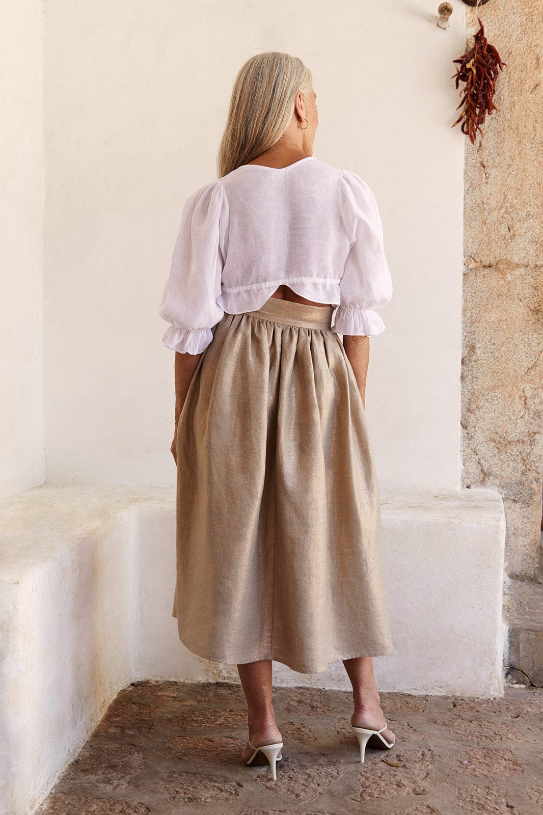 arkitaip Skirts The Paulina Midi Skirt in gold